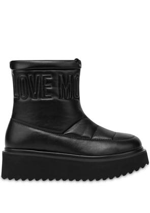 Love Moschino logo-embroidered flatform boots - Black