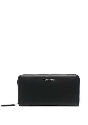 Calvin Klein logo-lettering zip-around wallet - Black