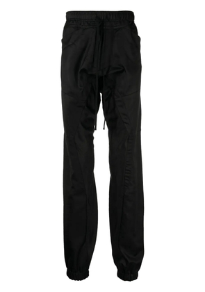 Julius drawstring-waist skinny trousers - Black