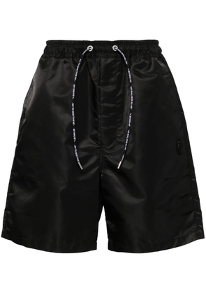 A BATHING APE® logo-embroidered relaxed-fit shorts - Black