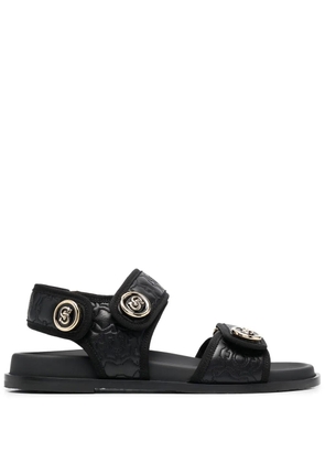 Ferragamo logo-plaque detail sandals - Black