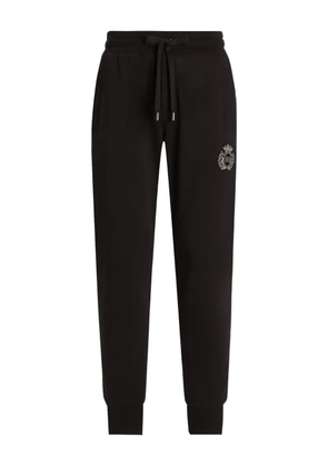 Dolce & Gabbana logo-embroidered track pants - Black