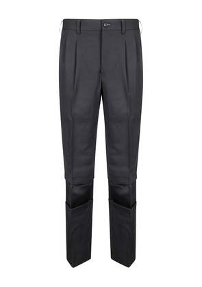 Comme Des Garçons Comme Des Garçons pleat-detail pinstriped trousers - Black