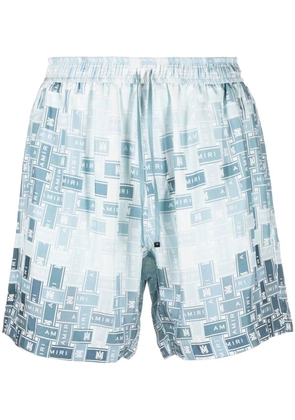AMIRI pattern-logo-printed silk shorts - Blue