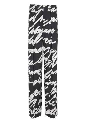 Balmain Love Letter pleated trousers - Black
