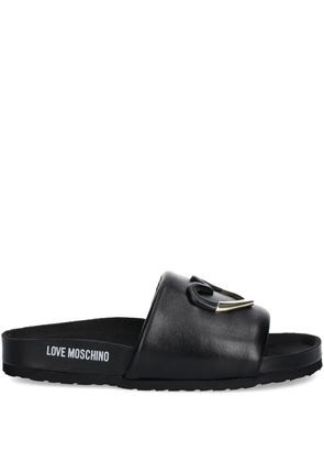 Love Moschino logo-print leather slides - Black