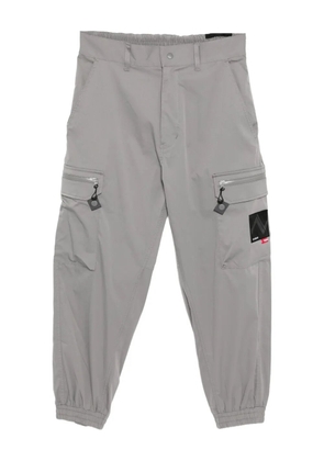 izzue logo-patched trousers - Grey
