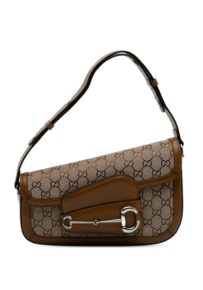 Gucci Pre-Owned 2016-2024 GG Canvas Asymmetric Horsebit 1955 shoulder bag - Brown