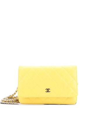 CHANEL Pre-Owned Wallet on Chain Quilted Lambskin crossbody bag - Yellow