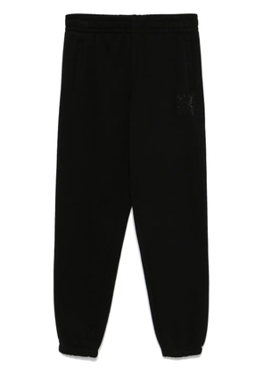 DKNY rhinestone-logo trousers - Black