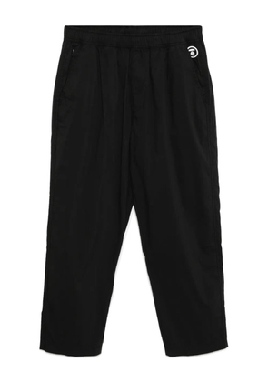 AAPE BY *A BATHING APE® logo-plaque trousers - Black