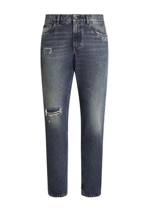 Dolce & Gabbana distressed logo-plaque jeans - Blue