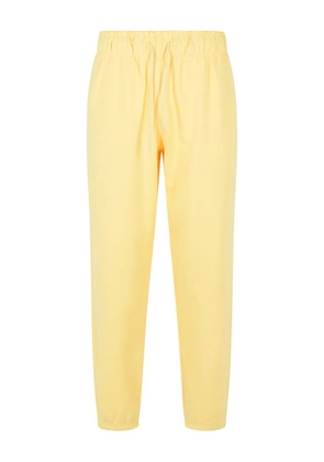 New Balance elastic-waistband logo-patch track pants - Yellow