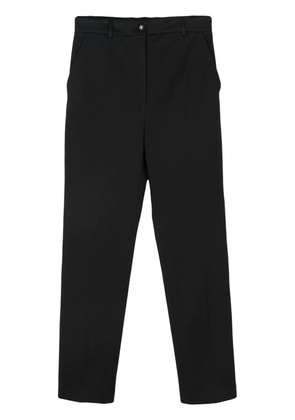 Dolce & Gabbana Pre-Owned Milano-rib tapered trousers - Black