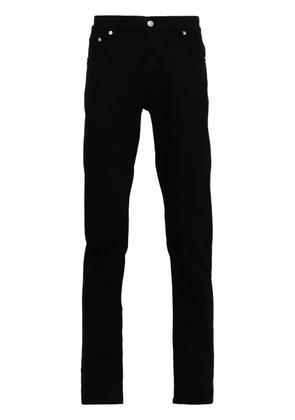 Alexander McQueen logo-embroidered jeans - Black