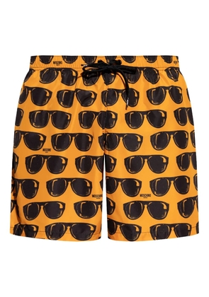 Moschino glasses-pattern swim shorts - Orange