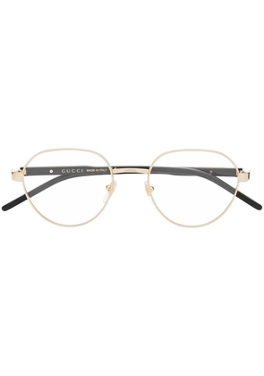 Gucci Eyewear oval-frame optical glasses - Gold
