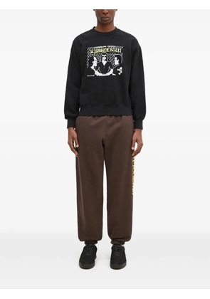 Aries slogan-print sweatpants - Brown