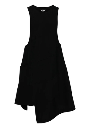 Black Comme Des Garçons asymmetric dress