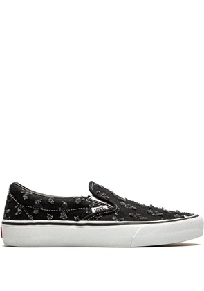 Vans x Supreme Slip-On Pro 'Black Hole Punch Denim' sneakers