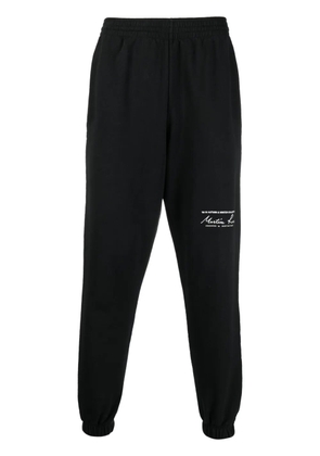 Martine Rose logo-print slim-fit track pants - Black