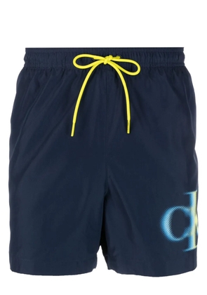 Calvin Klein logo-print swim shorts - Blue