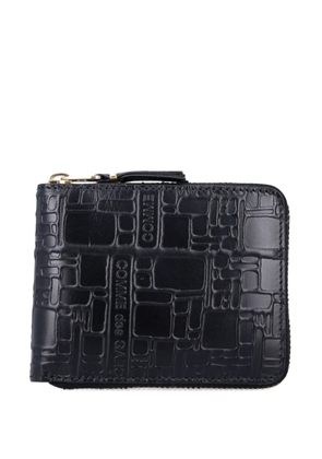 Comme Des Garçons Wallet embossed-logo zip wallet - Black