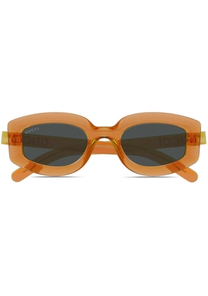 Gucci Eyewear logo-print sunglasses - Orange