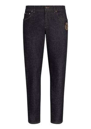 Dolce & Gabbana logo-appliqué tapered jeans - Blue