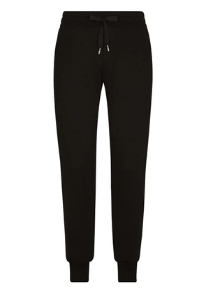 Dolce & Gabbana logo-embroidered track pants - Black