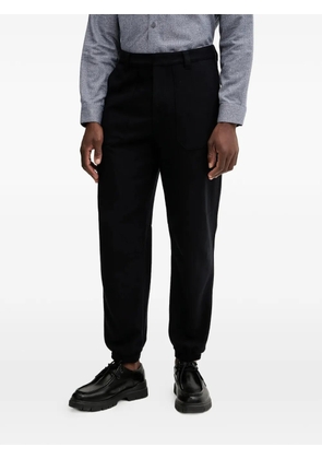 Armani Exchange logo-plaque trousers - Black