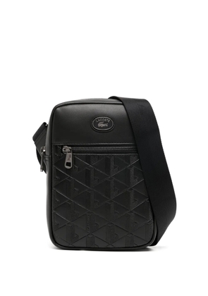 Lacoste embossed-monogram panelled messenger bag - Black
