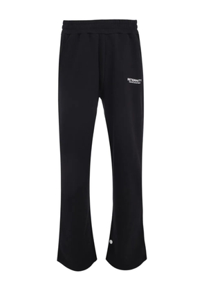 RETERNITY logo-detail track pants - Black