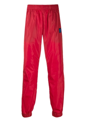 Off-White logo trim track trousers - Red