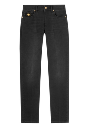 Versace Medusa Head-embellished mid-rise slim-fit jeans - Black