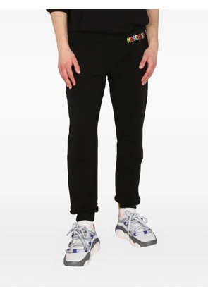 Moschino logo-print trousers - Black