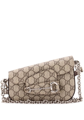 Gucci Pre-Owned Horsebit 1955 Asymmetric GG Coated Canvas Mini shoulder bag - Brown