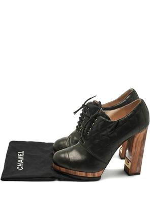 CHANEL Pre-Owned quilted lace-up pumps - Black