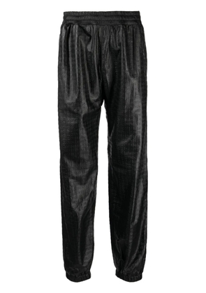 Givenchy embossed-4G pattern leather trousers - Black