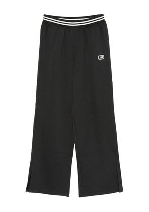 New Balance elasticated-waistband split-hem trousers - Black