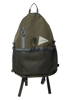and Wander triangular-logo backpack - Green