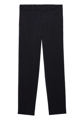 Prada triangle-logo trousers - Black