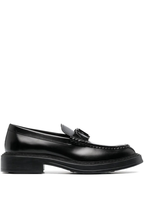 Tod's logo-plaque leather loafers - Black