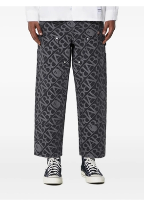 A BATHING APE® logo-pattern carpenter jeans - Black