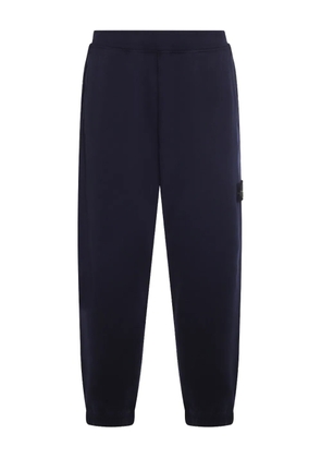 Stone Island patch-pocket cotton track pants - Blue
