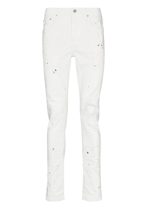 Purple Brand paint splatter-print skinny-cut jeans - White