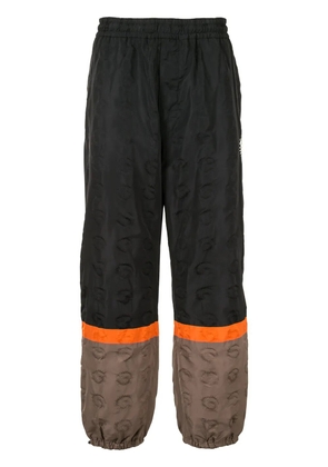 Undercover colour-block track pants - Black