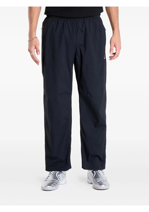 Nike ACG-logo zip-pockets track pants - Black