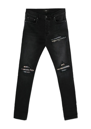 AMIRI patchwork-distressed cotton jeans - Black