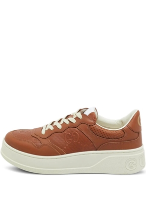 Gucci Pre-Owned Jumbo GG leather-embossed sneakers - Brown